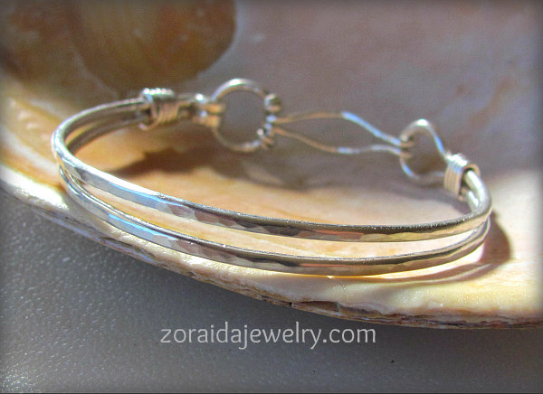 Hammered sterling bangle type bracelet with clasp